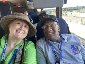 Honor Flight greeter (guardian) and veteran